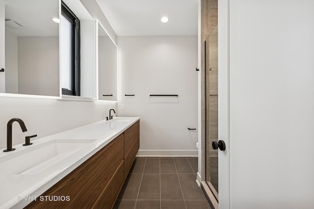 222 S Oakley Blvd Unit 3, Chicago, IL 60612 - full bath with double vanity, a shower stall, tile patterned flooring, and recessed lighting