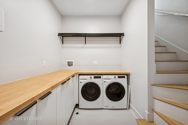 222 S Oakley Blvd Unit 3, Chicago, IL 60612 - laundry room featuring washer and clothes dryer and light tile patterned floors