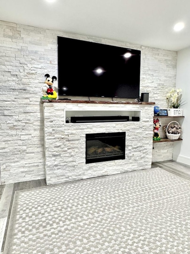 1211 Highland Dr, Prospect Heights, IL 60070 - detailed view of a fireplace, wood finished floors, and recessed lighting