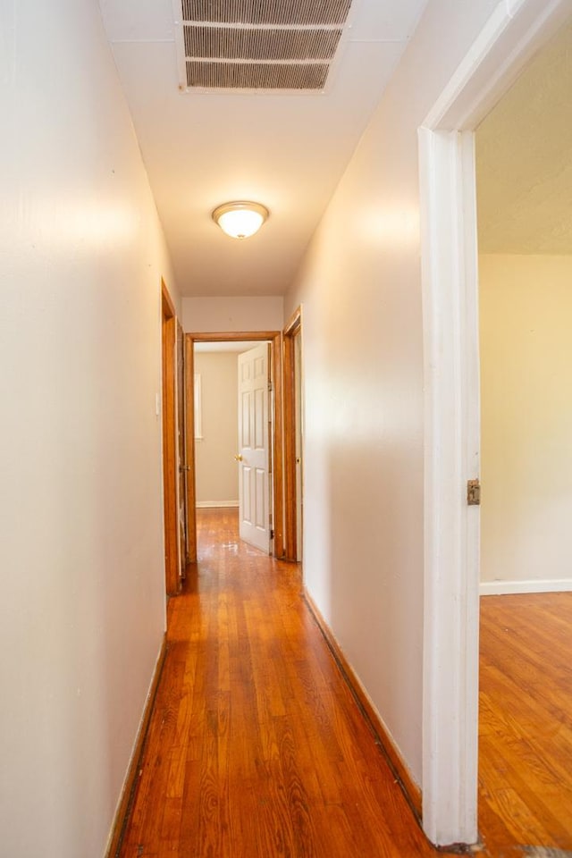 15533 Vincennes Rd, Phoenix, IL 60426 - corridor featuring wood finished floors