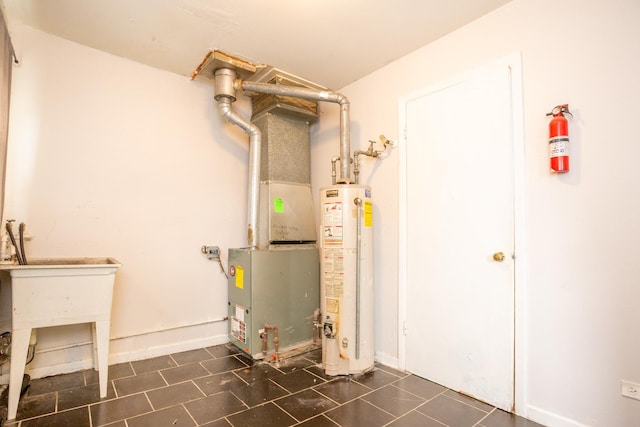 15533 Vincennes Rd, Phoenix, IL 60426 - utility room featuring water heater