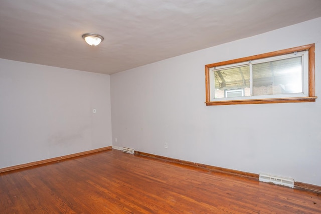 15533 Vincennes Rd, Phoenix, IL 60426 - spare room featuring wood finished floors