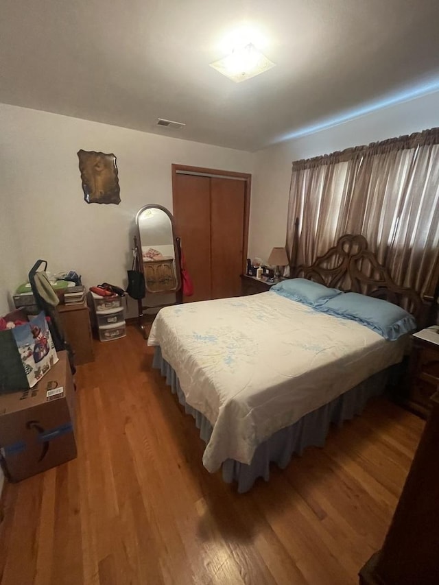 2940 N Nagle Ave, Chicago, IL 60634 - bedroom featuring wood finished floors and a closet