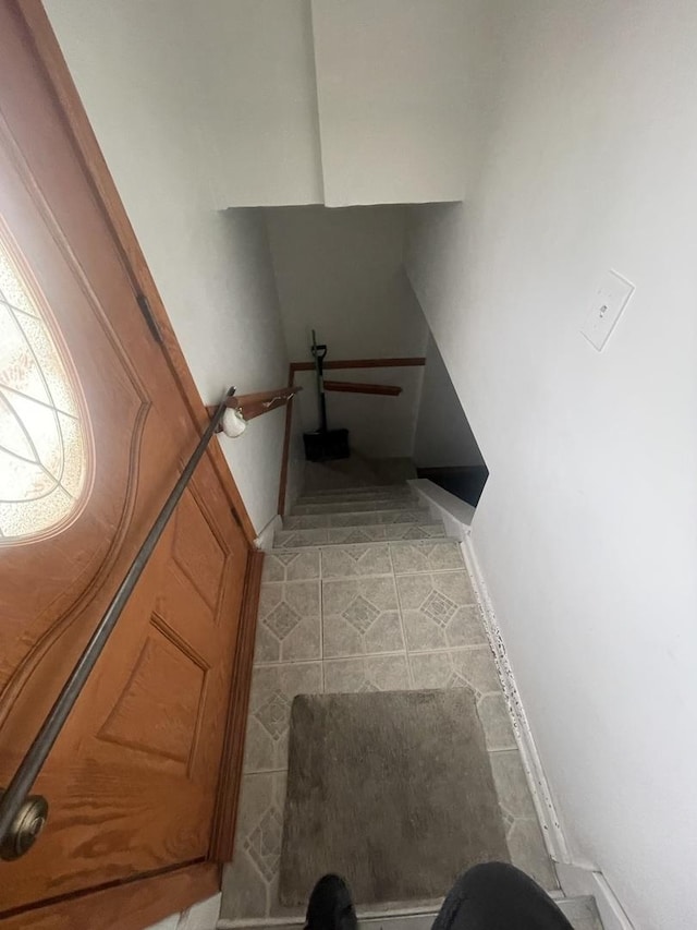 2940 N Nagle Ave, Chicago, IL 60634 - stairs featuring baseboards and tile patterned floors