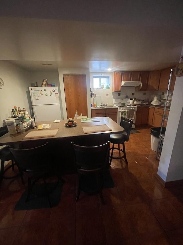 2940 N Nagle Ave, Chicago, IL 60634 - dining space featuring dark tile patterned floors