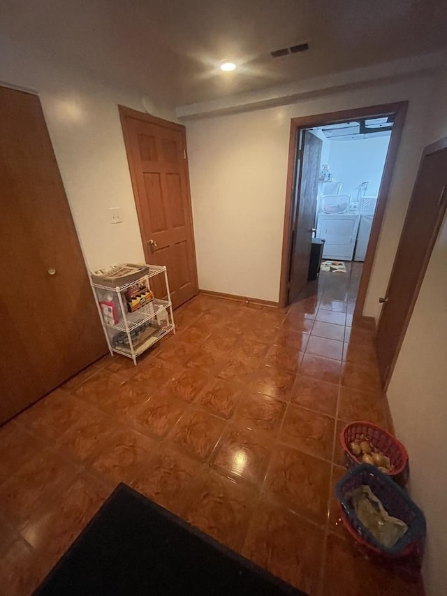 2940 N Nagle Ave, Chicago, IL 60634 - hallway featuring light tile patterned flooring and baseboards