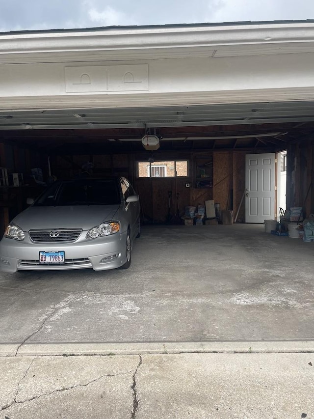 2940 N Nagle Ave, Chicago, IL 60634 - garage featuring a garage door opener