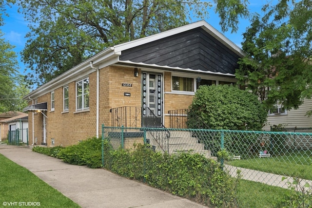 12358 S Lowe Ave, Chicago, IL 60628 - bungalow-style house with brick siding