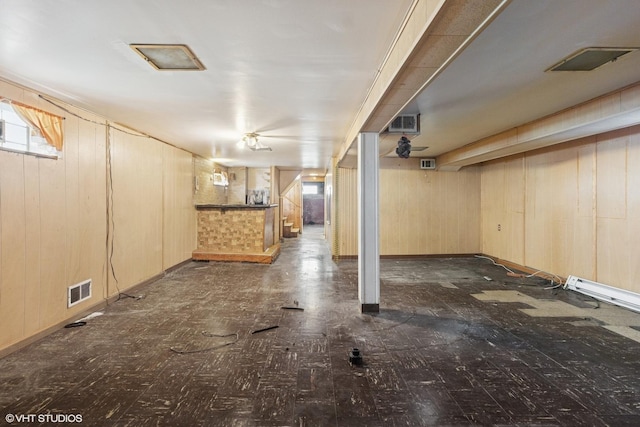 12358 S Lowe Ave, Chicago, IL 60628 - below grade area featuring baseboard heating and wood walls