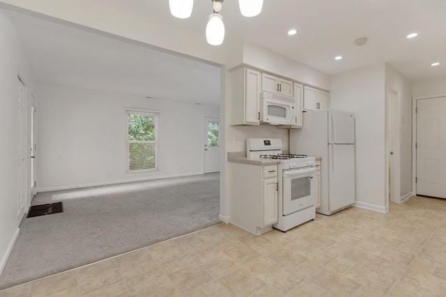 735 Wellington Ave, Elk Grove Village, IL 60007 - kitchen featuring white appliances, light colored carpet, white cabinetry, recessed lighting, and light countertops