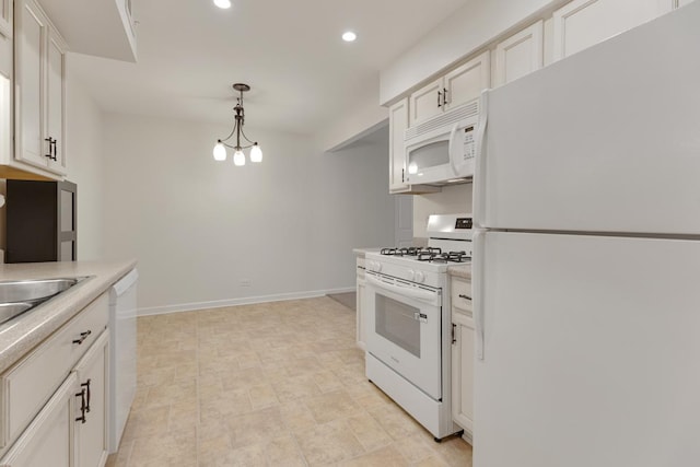 735 Wellington Ave, Elk Grove Village, IL 60007 - kitchen with white appliances, recessed lighting, light countertops, decorative light fixtures, and white cabinetry