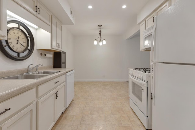 735 Wellington Ave, Elk Grove Village, IL 60007 - kitchen with white appliances, recessed lighting, white cabinets, hanging light fixtures, and light countertops