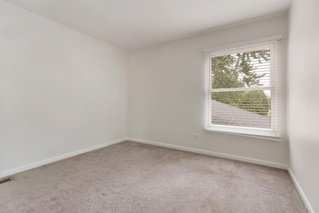 735 Wellington Ave, Elk Grove Village, IL 60007 - empty room featuring light colored carpet and baseboards