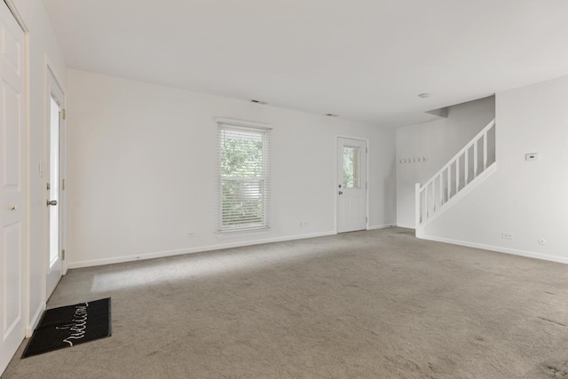 735 Wellington Ave, Elk Grove Village, IL 60007 - carpeted foyer entrance featuring stairs and baseboards