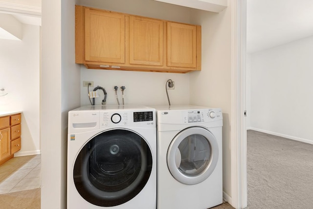 735 Wellington Ave, Elk Grove Village, IL 60007 - laundry area with washer and dryer, cabinet space, light colored carpet, and light tile patterned flooring