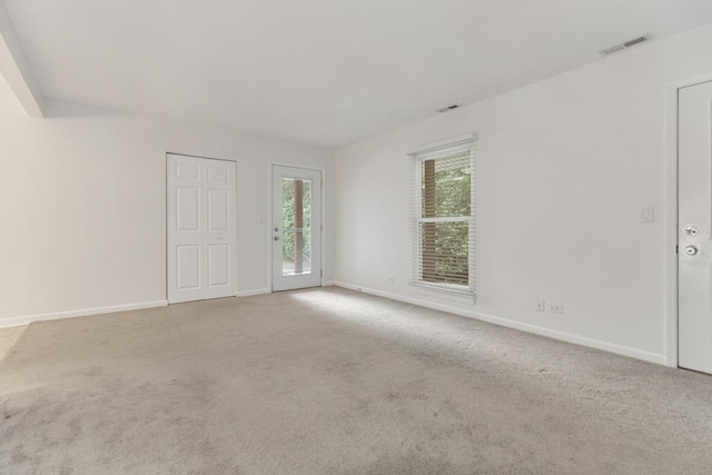 735 Wellington Ave, Elk Grove Village, IL 60007 - spare room featuring carpet flooring and healthy amount of natural light