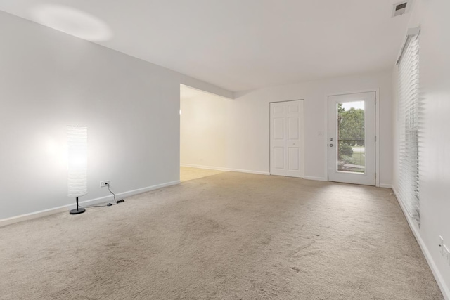 735 Wellington Ave, Elk Grove Village, IL 60007 - spare room featuring light colored carpet