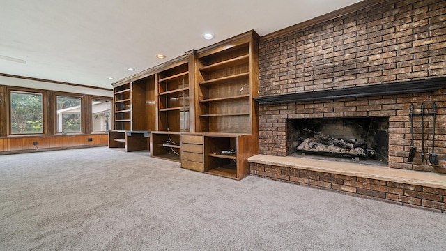 5809 Inverness Dr, Rockford, IL 61107 - unfurnished living room with carpet floors, a brick fireplace, crown molding, and recessed lighting
