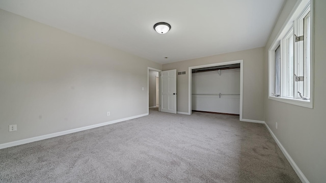 5809 Inverness Dr, Rockford, IL 61107 - unfurnished bedroom with carpet floors and a closet
