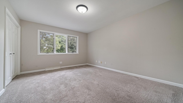 5809 Inverness Dr, Rockford, IL 61107 - unfurnished bedroom featuring carpet floors and baseboards