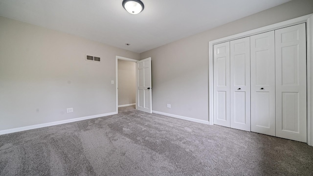 5809 Inverness Dr, Rockford, IL 61107 - unfurnished bedroom featuring carpet flooring and a closet