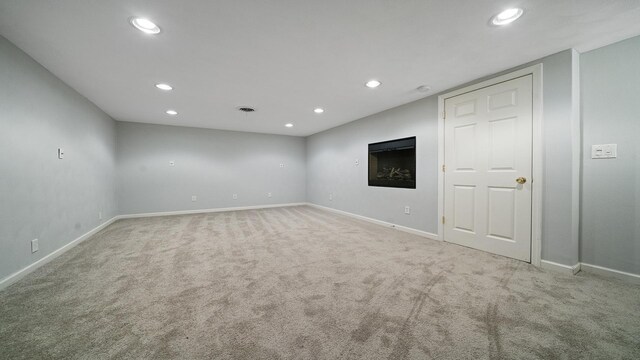 5809 Inverness Dr, Rockford, IL 61107 - spare room with carpet and recessed lighting