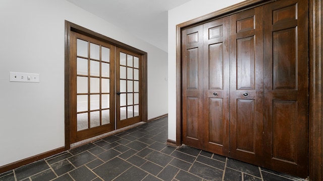 5809 Inverness Dr, Rockford, IL 61107 - entryway featuring french doors and baseboards