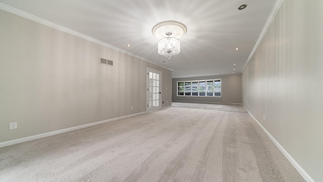 5809 Inverness Dr, Rockford, IL 61107 - empty room featuring crown molding, a chandelier, and carpet flooring