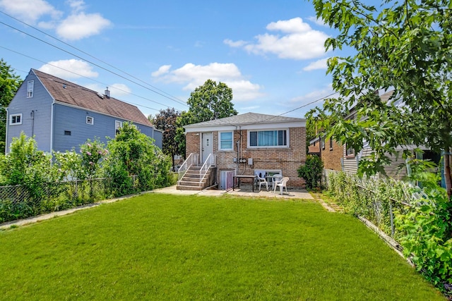 3241 S 53rd Ct, Cicero, IL 60804 - rear view of house with brick siding and a fenced backyard