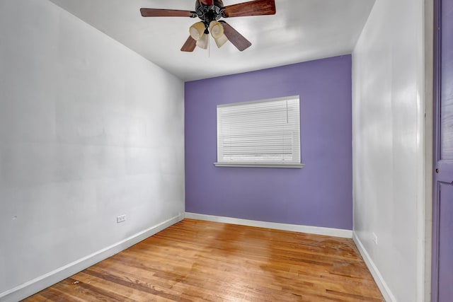 3241 S 53rd Ct, Cicero, IL 60804 - spare room with wood finished floors and ceiling fan