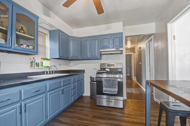3241 S 53rd Ct, Cicero, IL 60804 - kitchen with blue cabinetry, stainless steel range with gas cooktop, under cabinet range hood, and dark wood finished floors