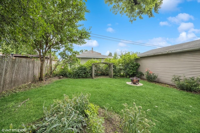 1300 Highridge Pkwy, Westchester, IL 60154 - fenced backyard featuring a fire pit