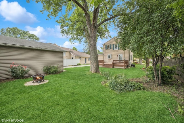 1300 Highridge Pkwy, Westchester, IL 60154 - view of yard with an outdoor fire pit and a deck