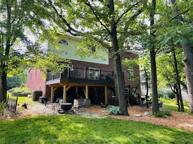 1448 Chestnut Xing, Lemont, IL 60439 - rear view of property with a yard, a deck, a patio area, and brick siding