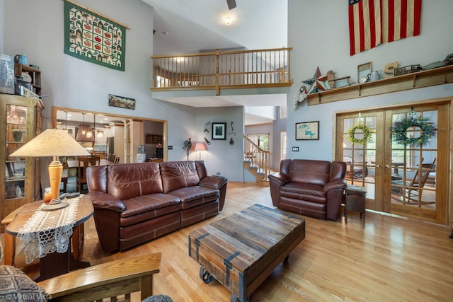 1448 Chestnut Xing, Lemont, IL 60439 - living room featuring a high ceiling, stairs, wood finished floors, and french doors