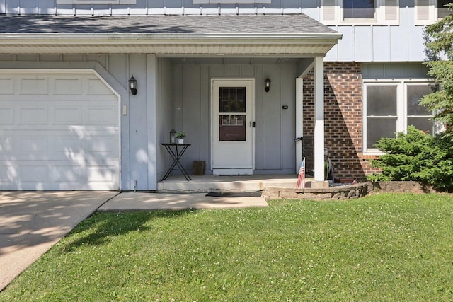 32 Woodridge Ln, Streamwood, IL 60107 - entrance to property with brick siding, roof with shingles, board and batten siding, and a yard