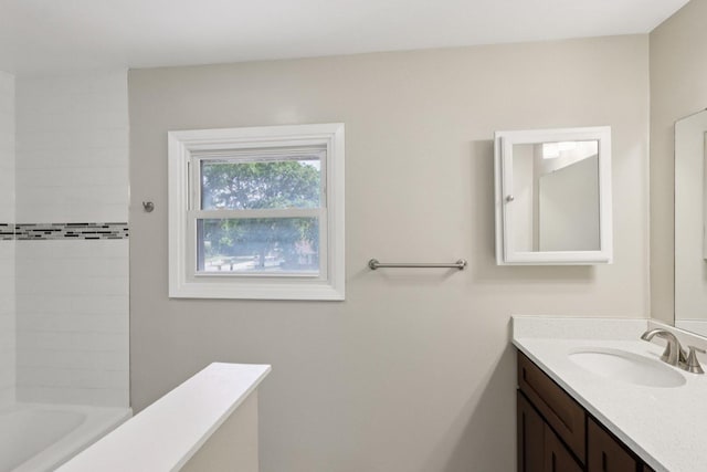32 Woodridge Ln, Streamwood, IL 60107 - bathroom featuring vanity and bathing tub / shower combination