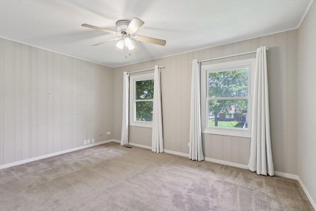 32 Woodridge Ln, Streamwood, IL 60107 - carpeted empty room featuring ceiling fan and baseboards
