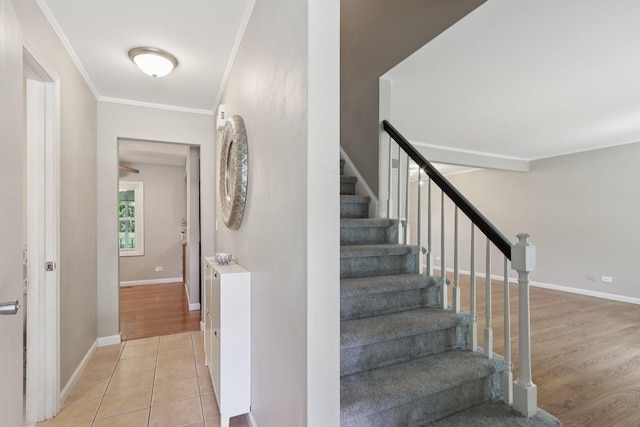 32 Woodridge Ln, Streamwood, IL 60107 - stairs with ornamental molding and wood finished floors