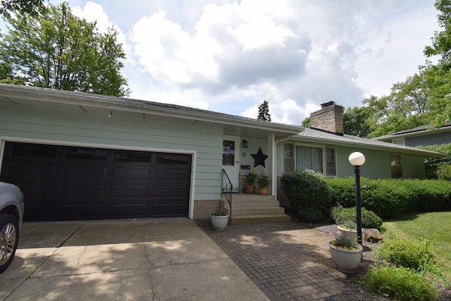 5 Knollcrest Ct, Normal, IL 61761 - single story home featuring driveway, a chimney, and a garage