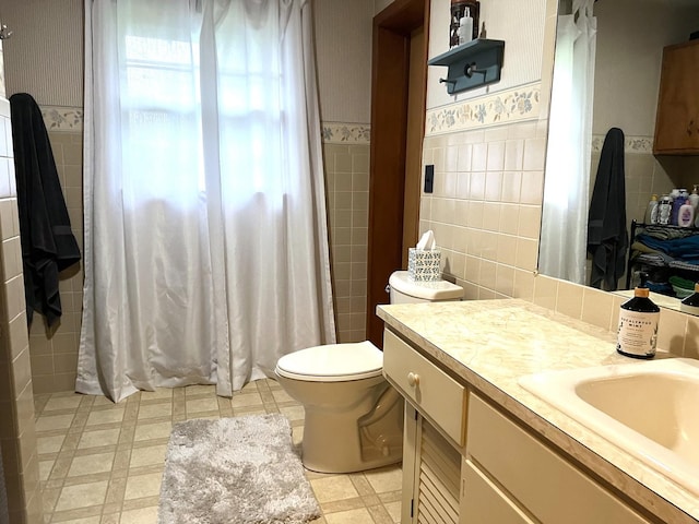 5 Knollcrest Ct, Normal, IL 61761 - bathroom featuring tile walls, vanity, tile patterned floors, wainscoting, and curtained shower