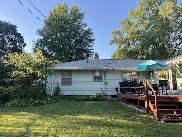 5 Knollcrest Ct, Normal, IL 61761 - rear view of property featuring a wooden deck, a chimney, a lawn, and roof with shingles