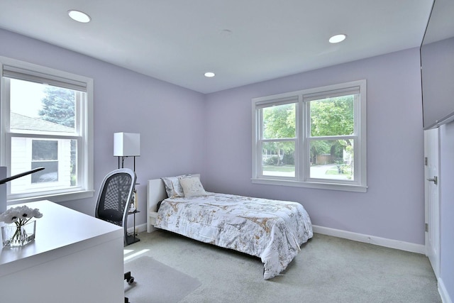 1747 Linneman St, Glenview, IL 60025 - bedroom with multiple windows, light colored carpet, recessed lighting, and a desk