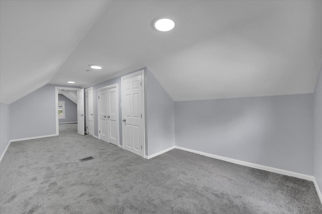 305 S Lewis Ave, Waukegan, IL 60085 - additional living space featuring lofted ceiling, carpet, and recessed lighting