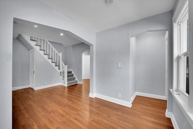 305 S Lewis Ave, Waukegan, IL 60085 - empty room with stairs and wood finished floors