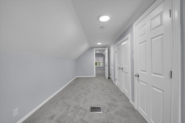 305 S Lewis Ave, Waukegan, IL 60085 - hallway with lofted ceiling and carpet floors