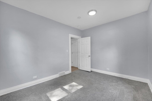 305 S Lewis Ave, Waukegan, IL 60085 - carpeted spare room with baseboards