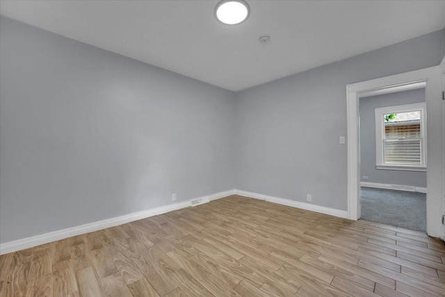 305 S Lewis Ave, Waukegan, IL 60085 - empty room featuring light wood-type flooring and baseboards