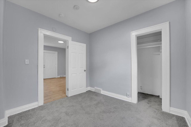 305 S Lewis Ave, Waukegan, IL 60085 - unfurnished bedroom with carpet and a closet
