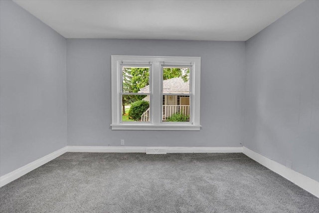305 S Lewis Ave, Waukegan, IL 60085 - empty room with carpet floors and baseboards